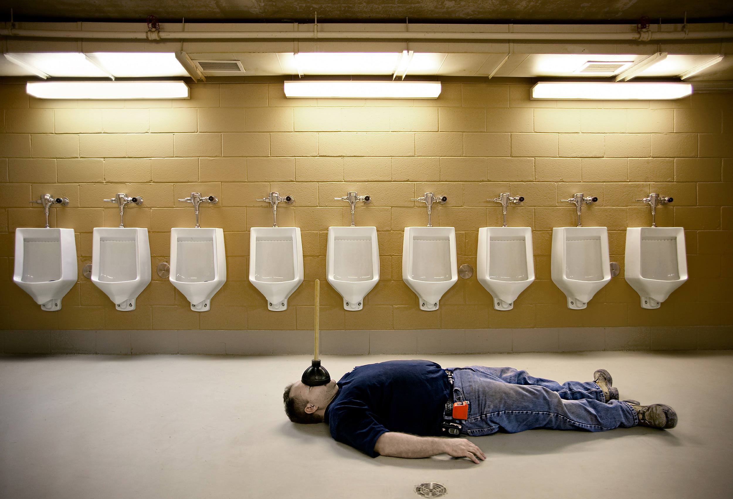  a toronto plumber pretends to be dead in front of urinals at the rogers centre
