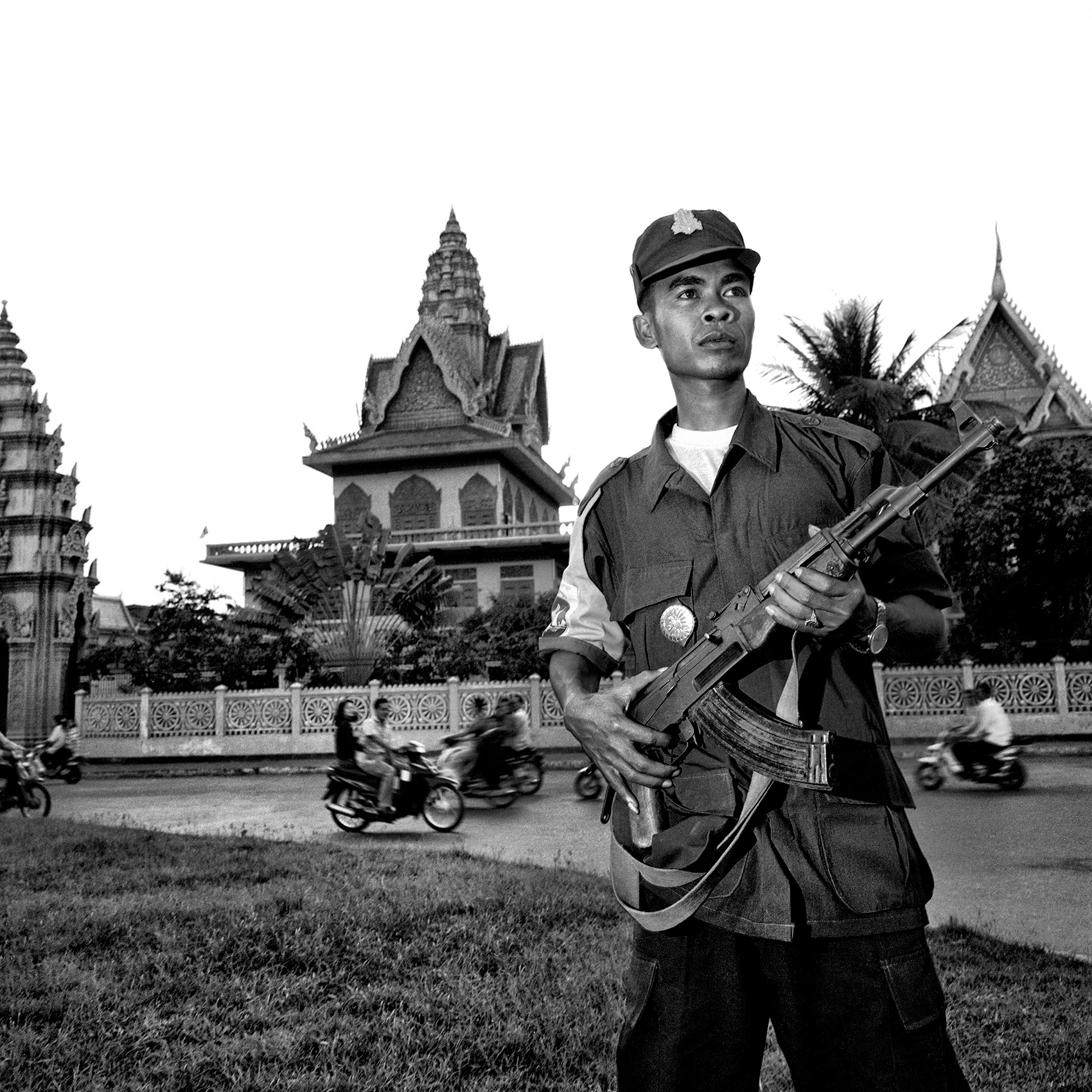 a-cambodian-soldier-holds-his-ak-47-as-patrols-the-streets-of-phnom-pehn-cambodia