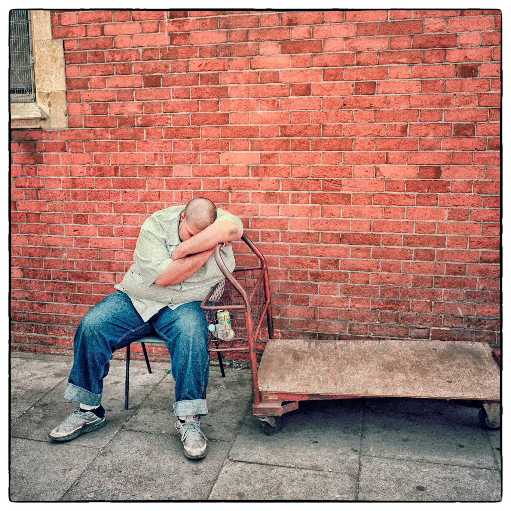 a-delivery-man-takes-a-rest-break-on-the-streets-of-central-london-england