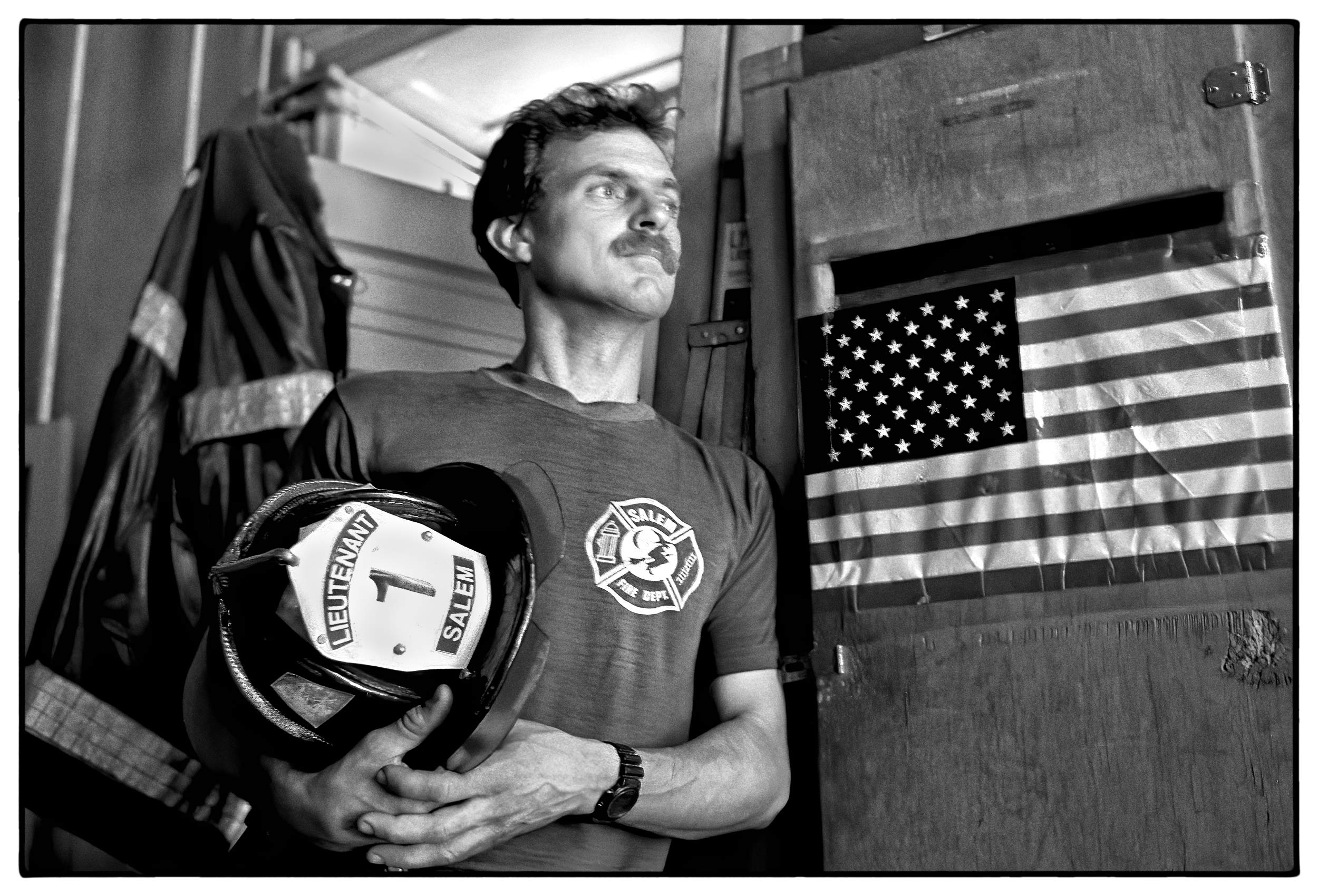 a-lieutenant-from-the-salem-massachusetts-fire-department-poses-for-a-photo-in-the-firehouse
