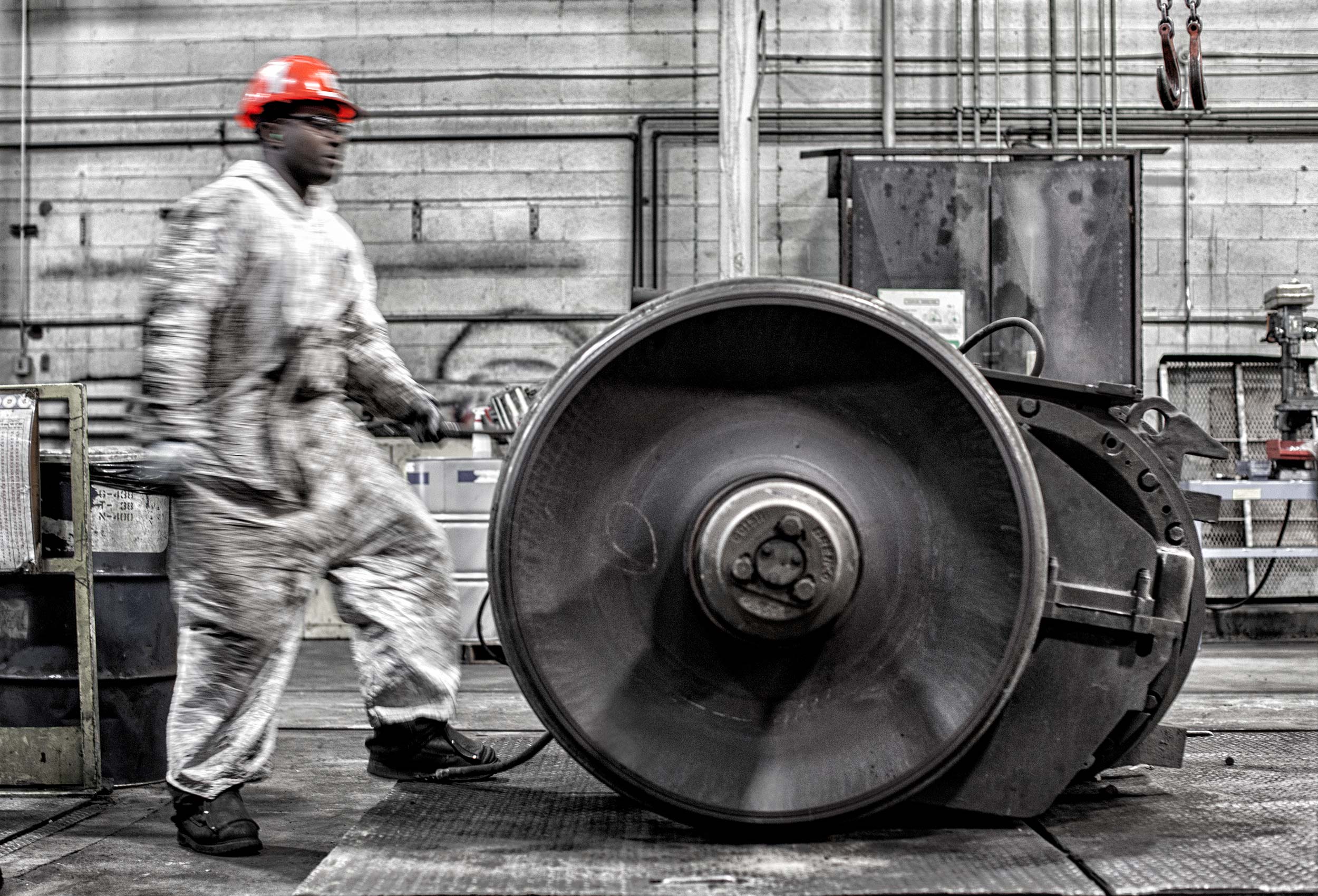 an industrial locomotive wheel gets prepared for hoisting at cp rail in calgary