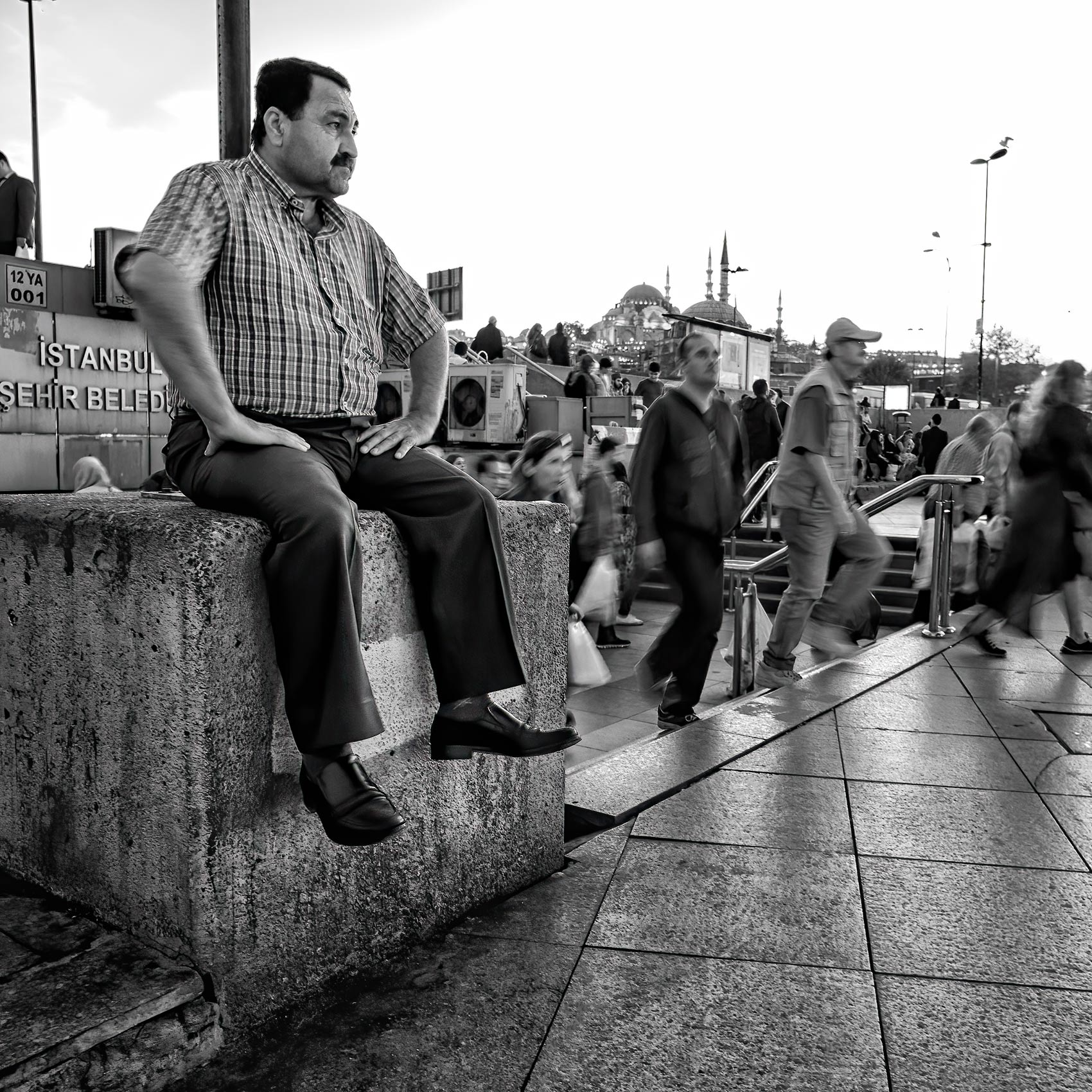 a-man-watches-over-the-harbour-in-the-eminonu-district-in-istanbul-turkey