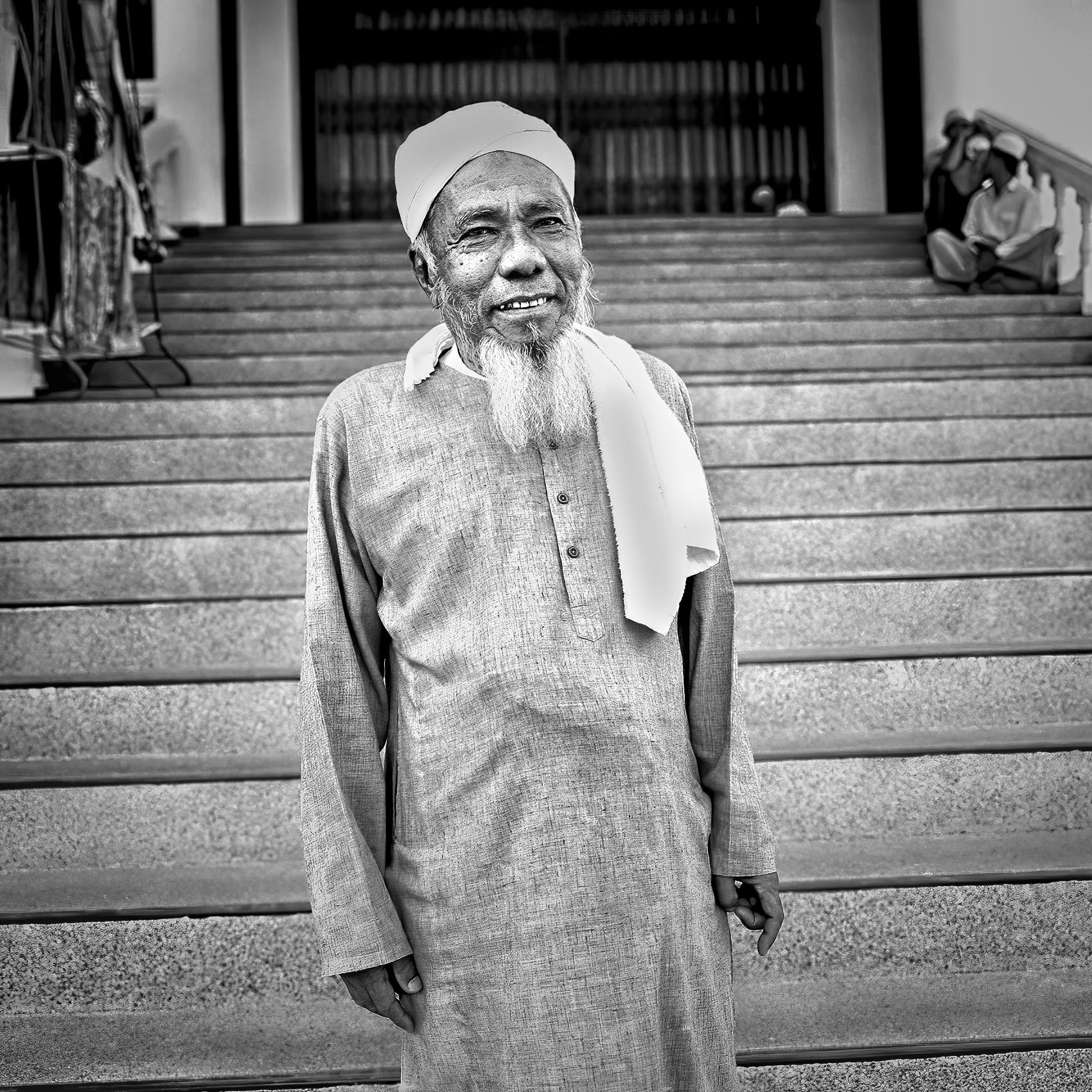 a-muslim-man-who-is-a-rohingya-minority-in-myanmar-poses-for-a-photo-outside-a-mosque-in-rakhine-state