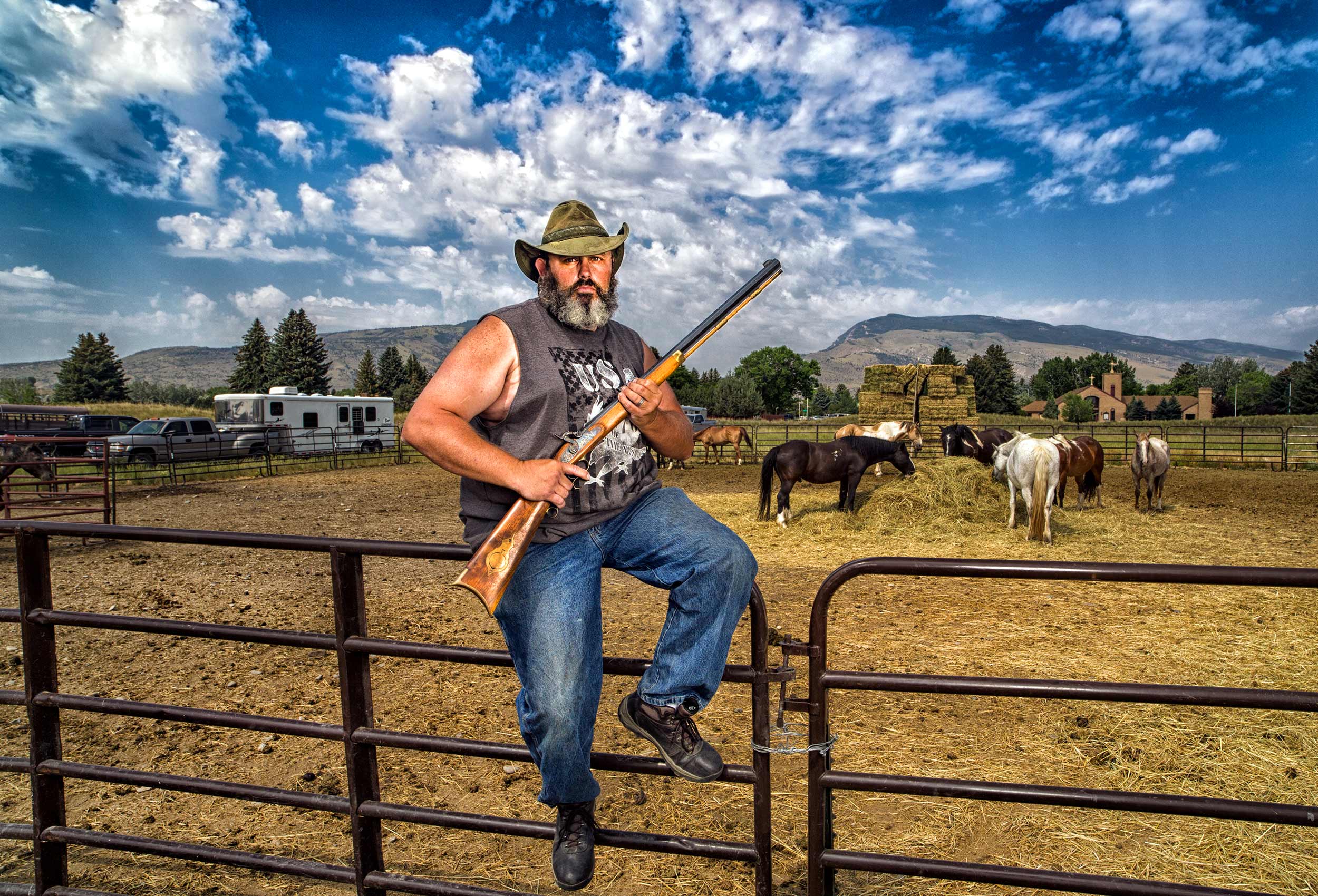 a portrait of a modern day cowboy at the stampede park in cody wyoming