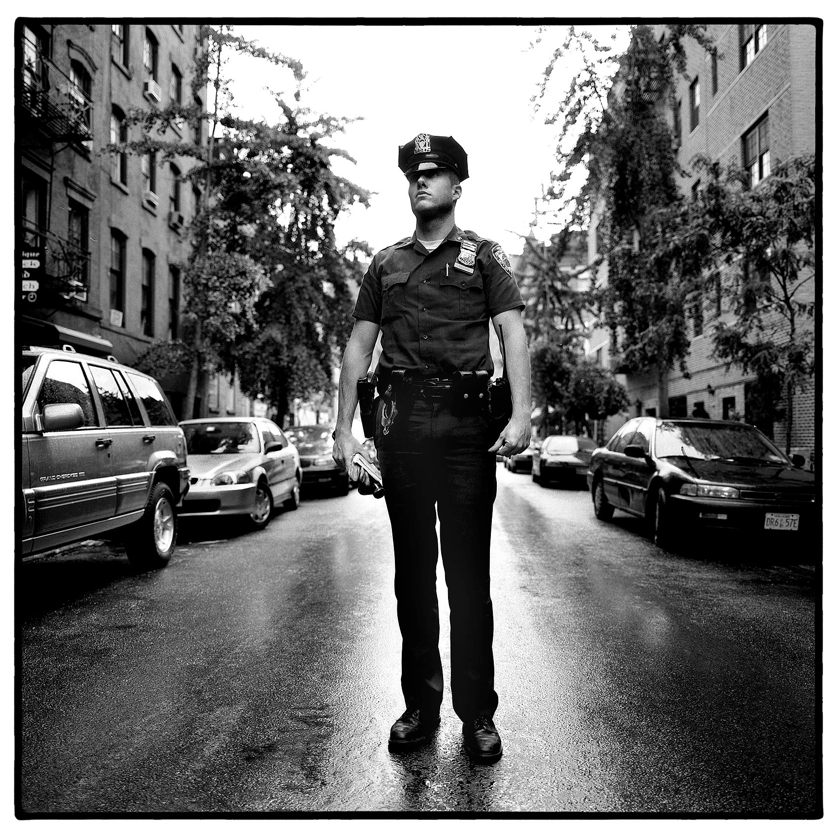 a-sixth-precinct-nypd-officer-poses-for-a-photo-in-new-yorks-greenwich-village
