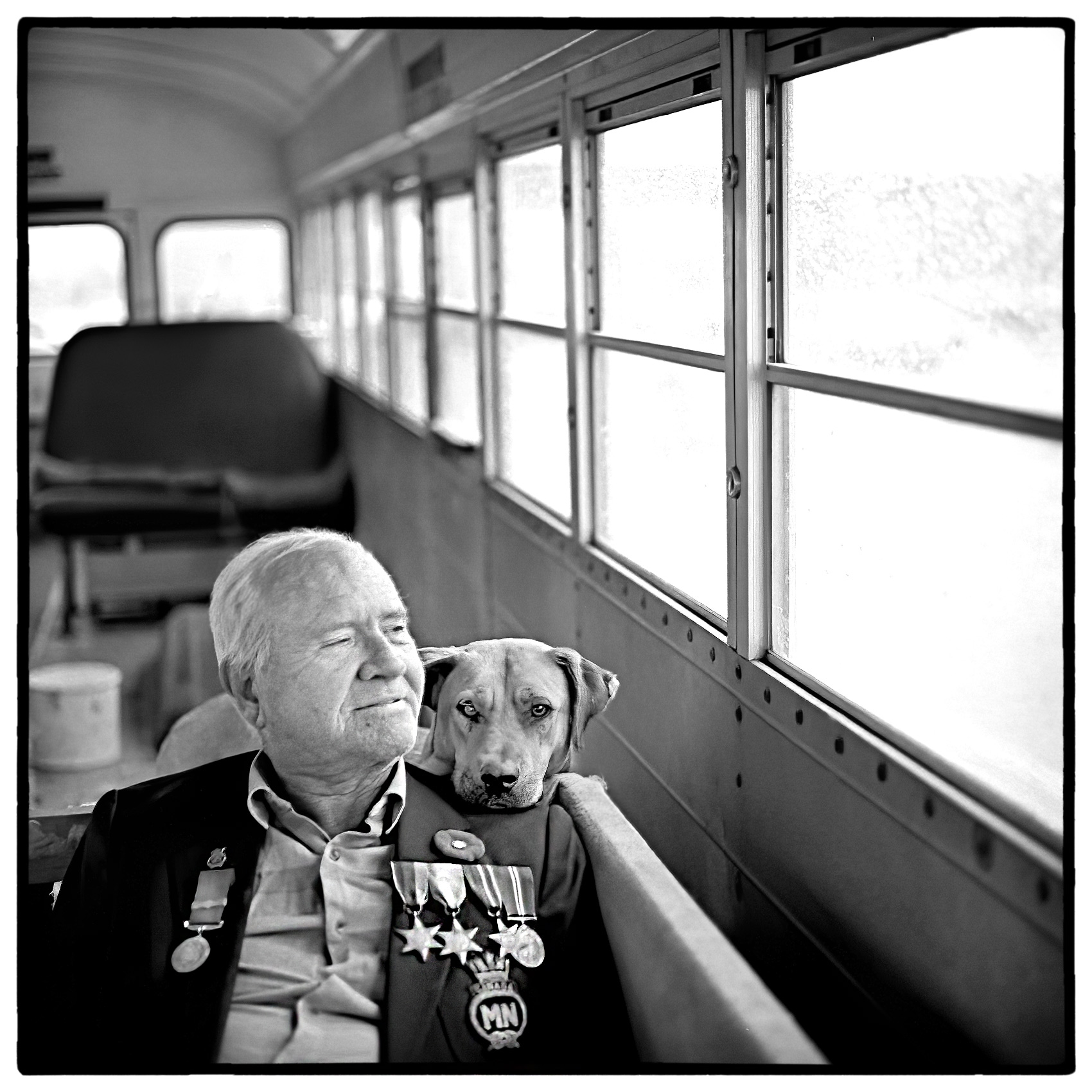 a-war-veteran-and-his-dog-who-live-in-a-school-bus-in-ottawa