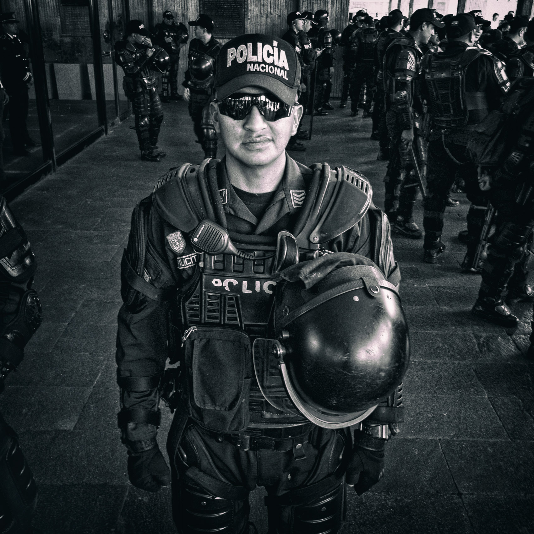 an-ecuadorian-riot-police-officer-poses-for-a-photo-during-a-protest-in-quito
