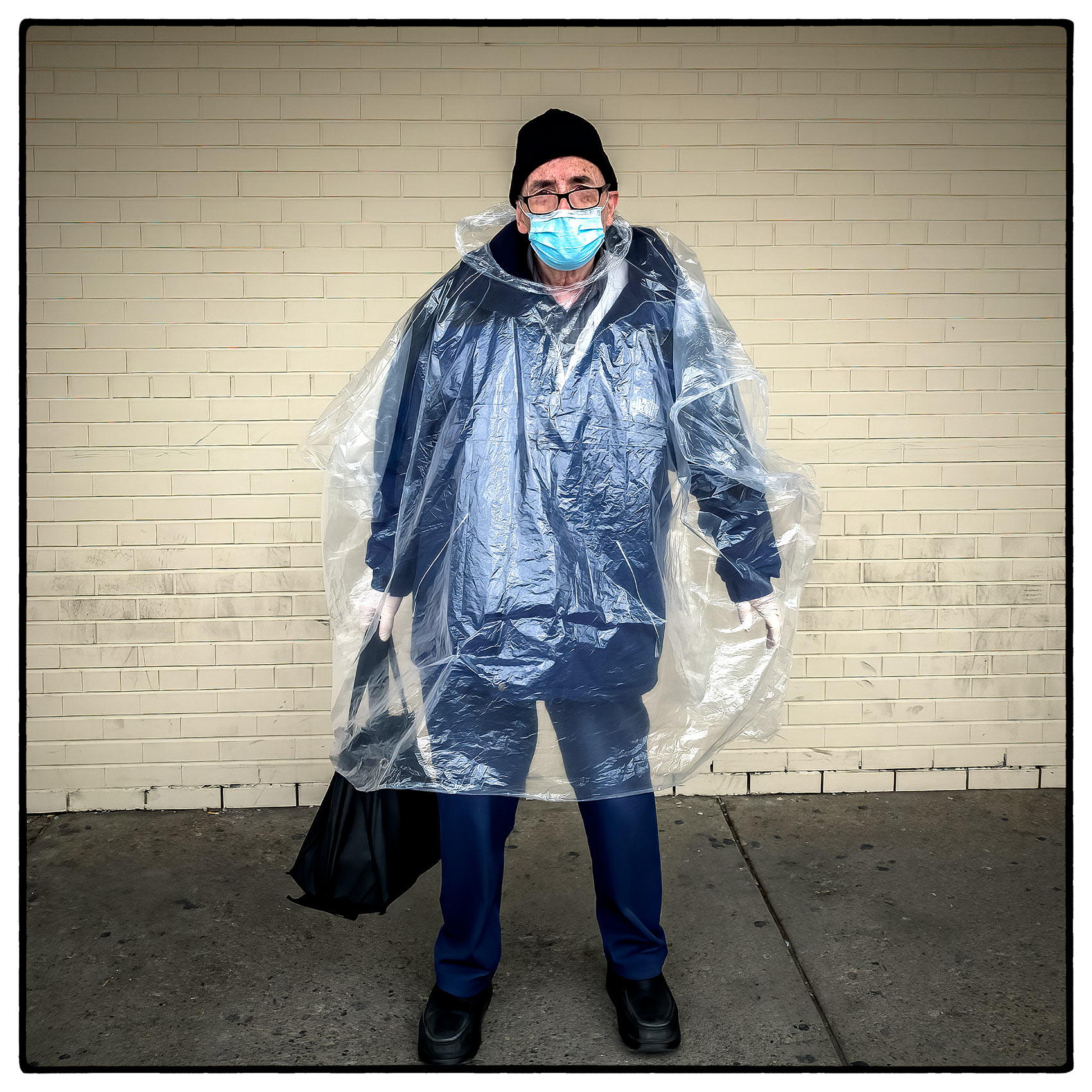 an elderly toronto man tries to protect himself by wearing a plastic bag during the pandemic