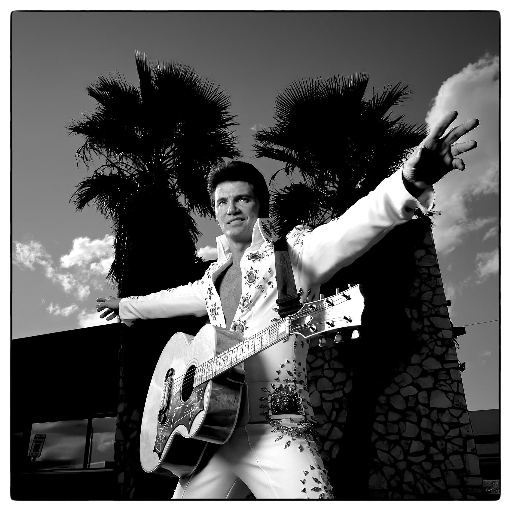 an-elvis-impersonator-poses-for-a-photo-outside-the-elvis-museum-in-las-vegas-nevada