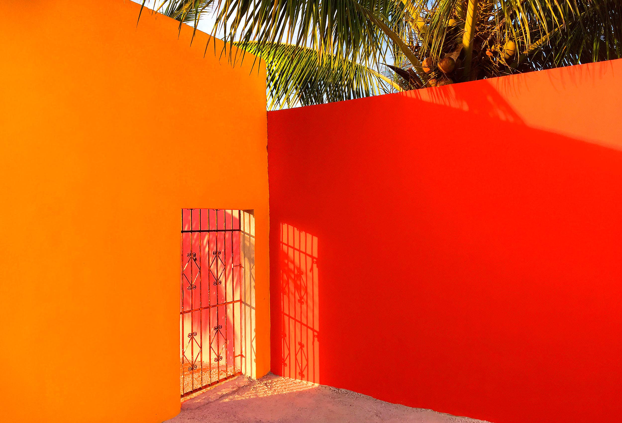 beautiful bright contrasting coloured wall in cozumel mexico 
