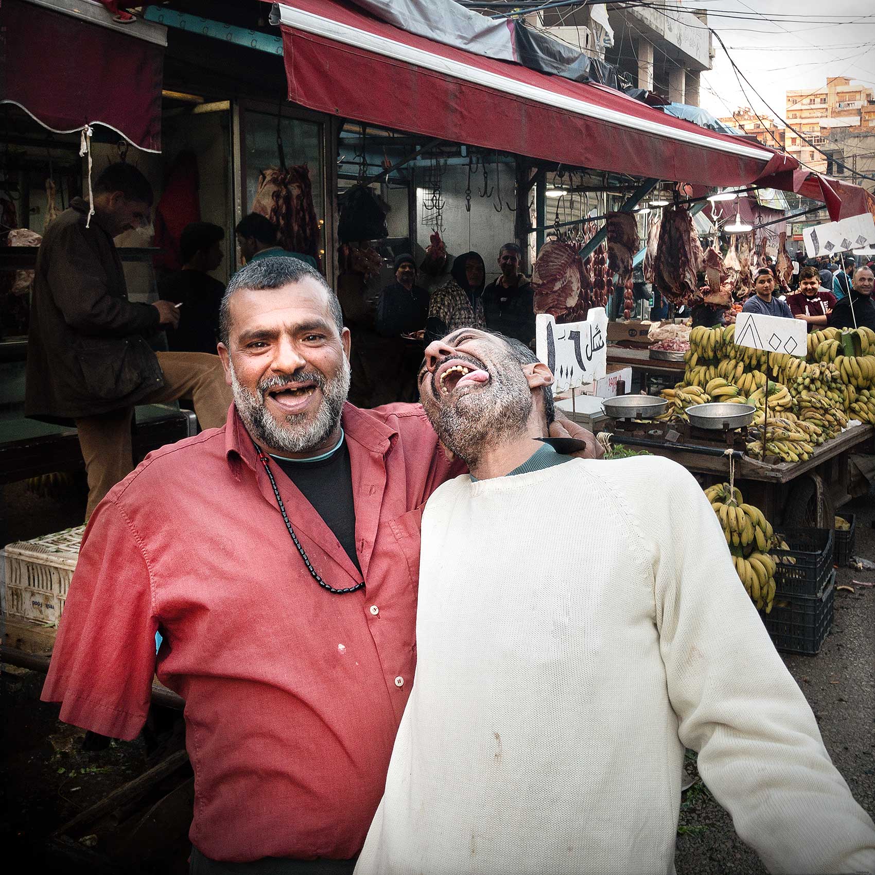 market vendors joke around at the mar elias market in southern beirut