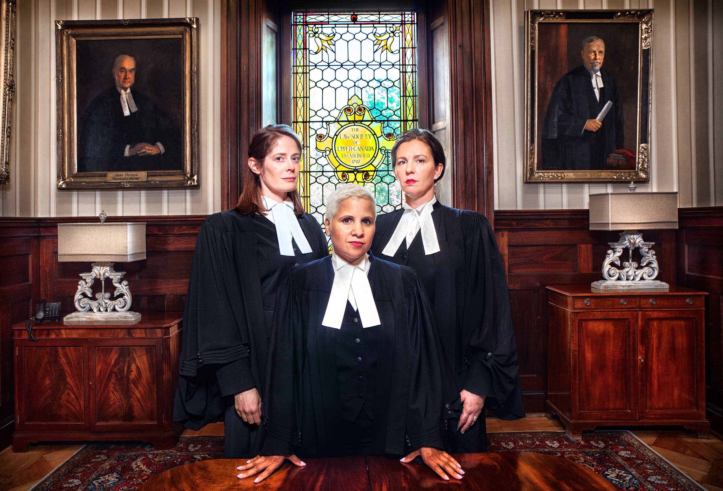 a  professional  business portrait of three toronto lawyers taken at the law society of upper canada