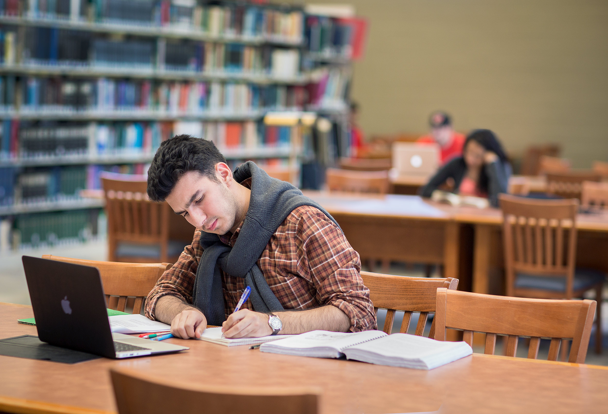 a york university student studying at the main campus library 