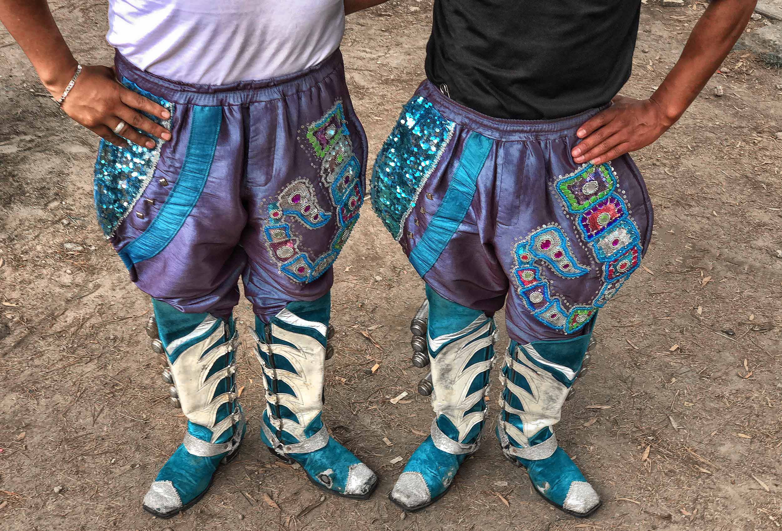 two-mayan-men-in-costume-in-a-park-in-quito-ecuador